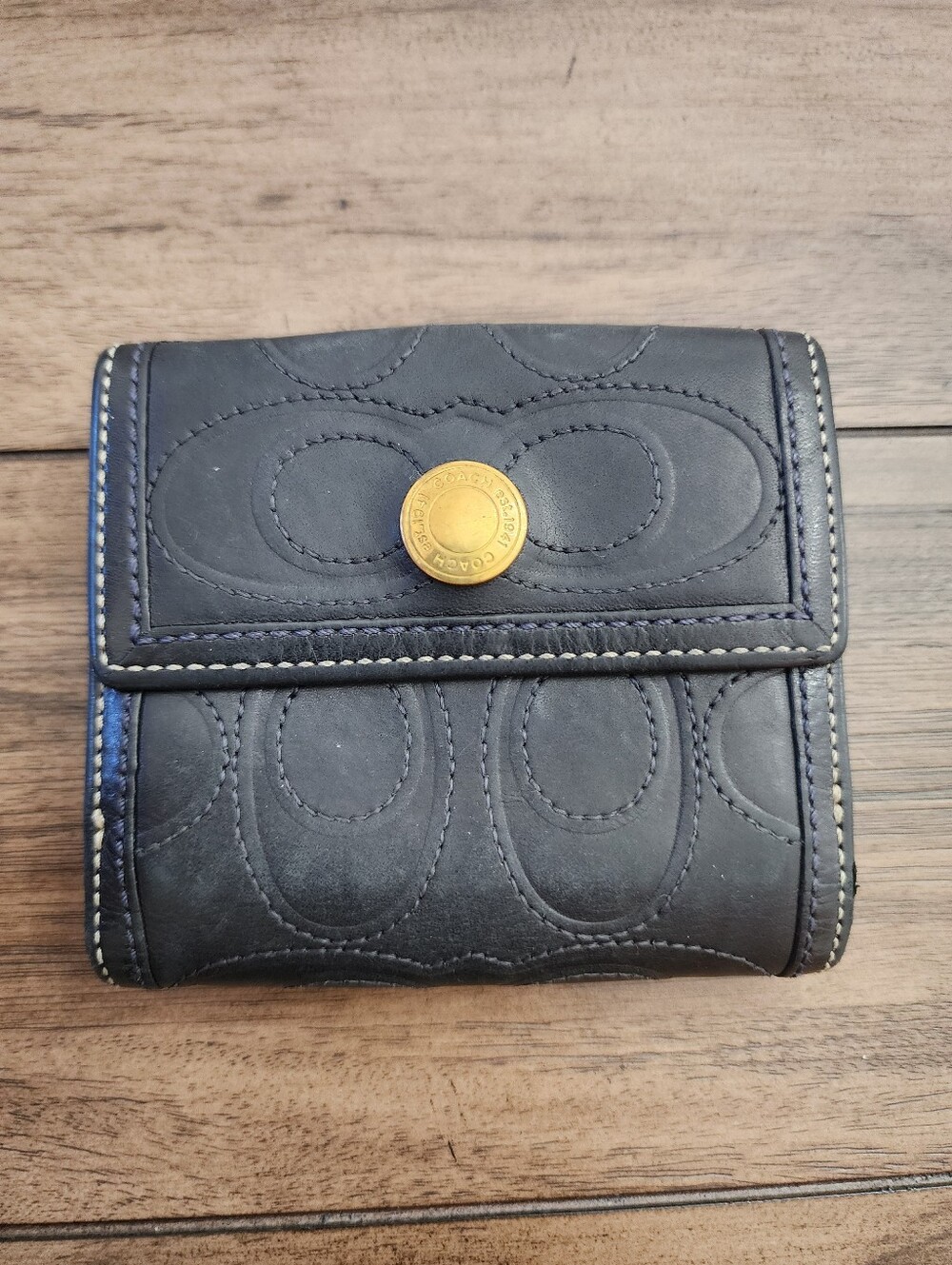 Coach Black Leather Trifold Wallet with Signature Stitching